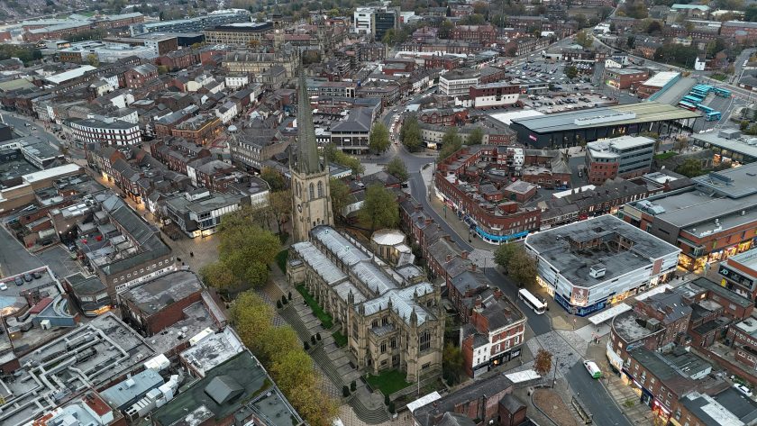 Aerial view of Wakefield city centre with historic architecture and commercial buildings, illustrating a thriving urban environment ideal for business grants Wakefield initiatives.
